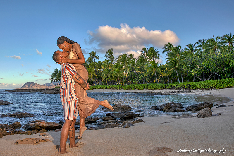 Romantic Portrait of Orlandrick lifting Simone for a Kiss, Secret Beach, Oahu, Hawaii
