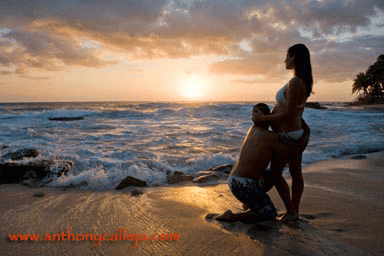 hands making a heart on the belly, Kapolei Maternity Photography, secret beach, Oahu Hawaii